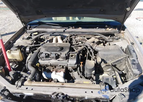 1999 Toyota Camry Solara Sle z USA, uszkodzony, nr VIN 2T1CF22P6XC239019